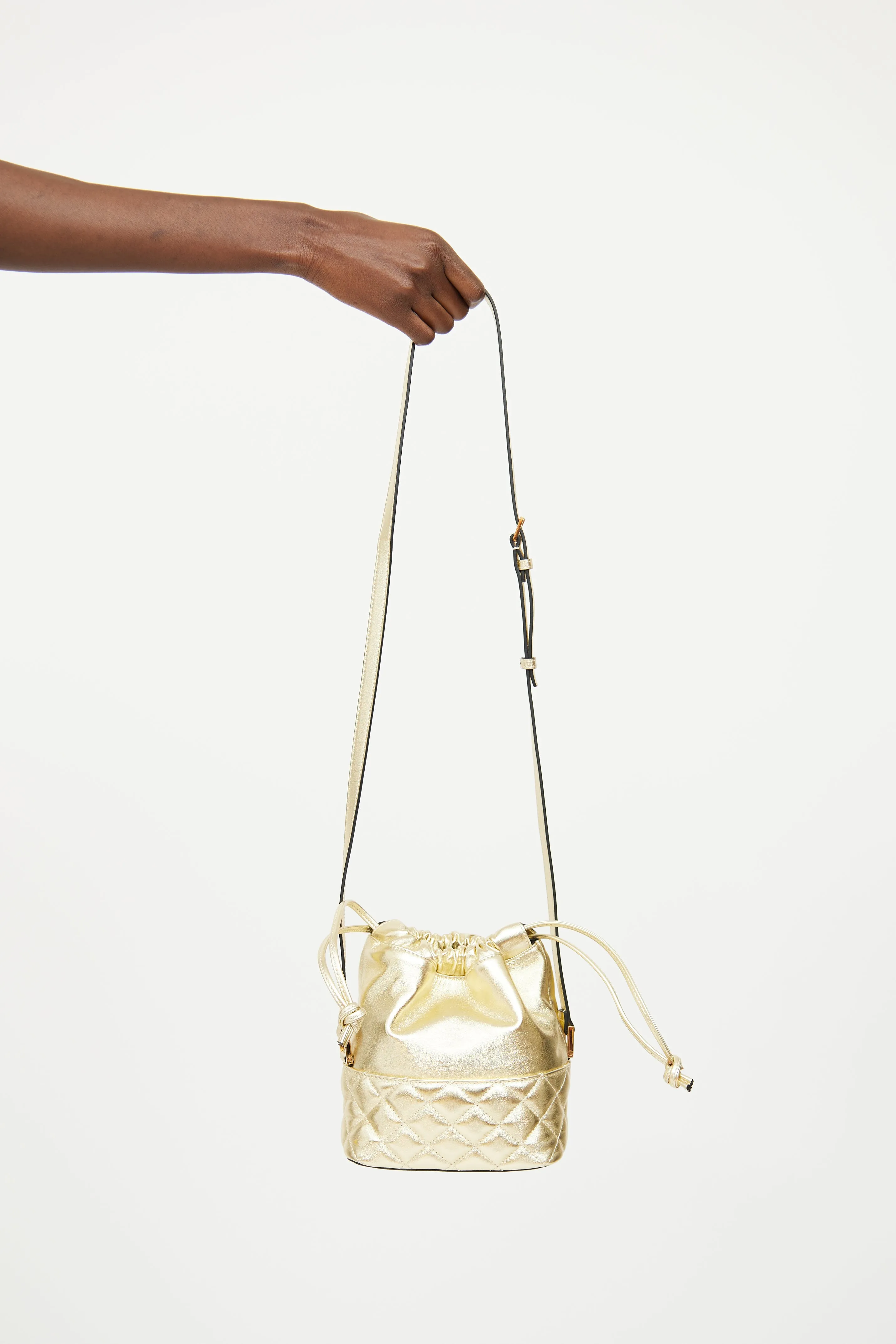 Gold Medusa Drawstring Bucket Bag