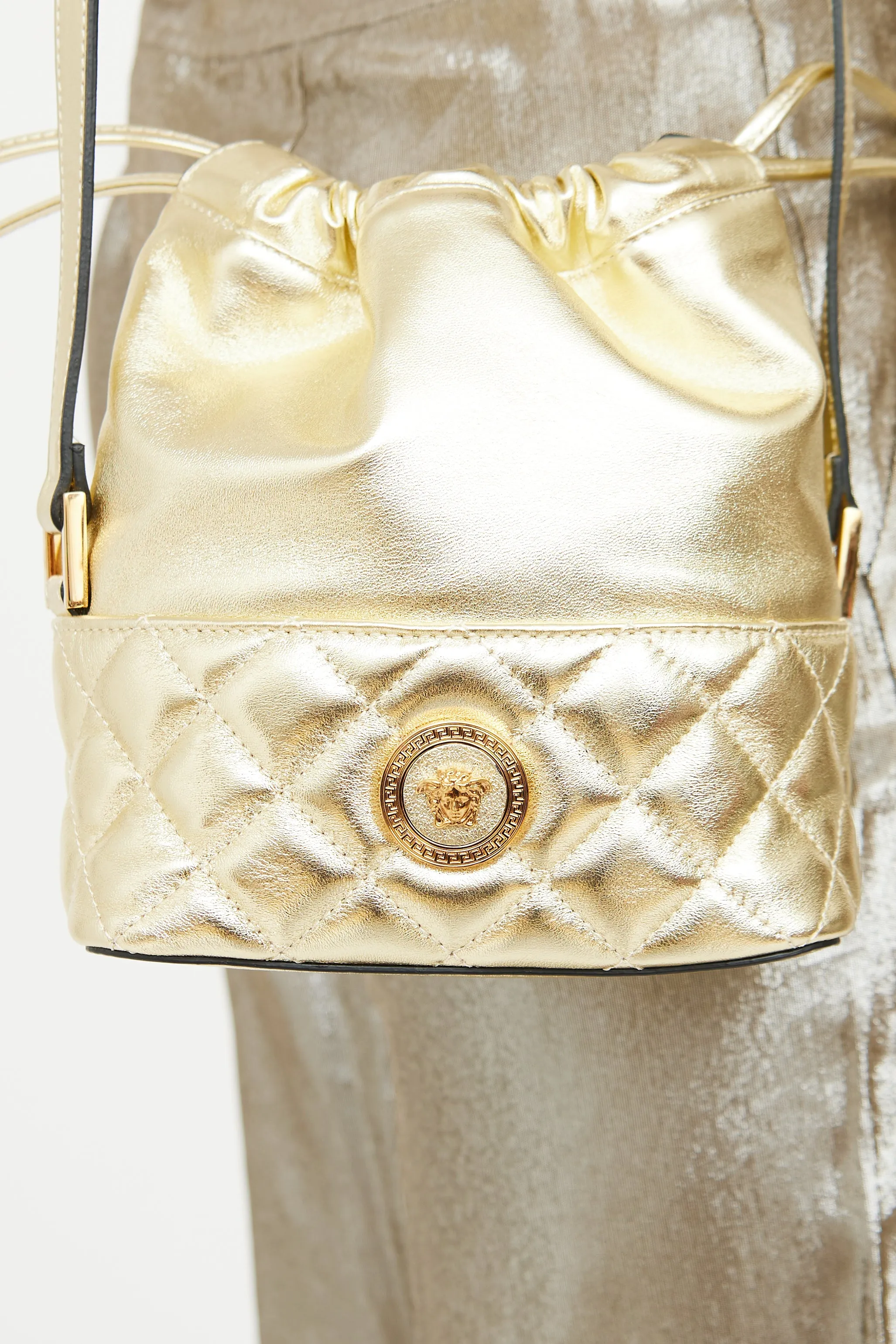 Gold Medusa Drawstring Bucket Bag