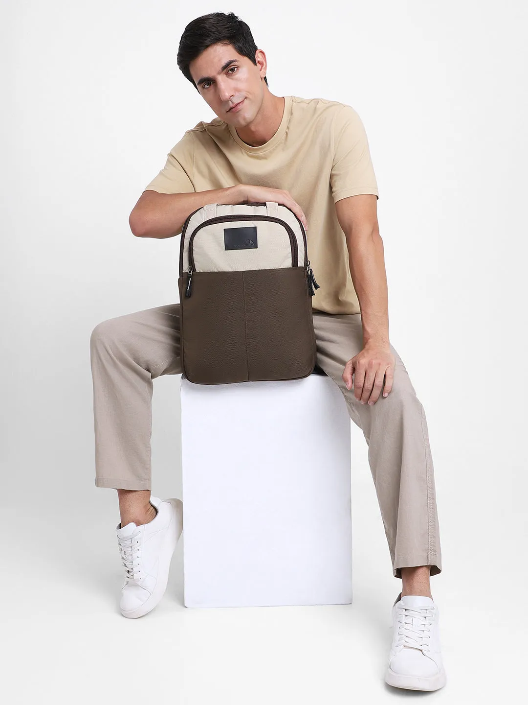 Men's Brown & Cream Travel Backpack with adjustable shoulder strap