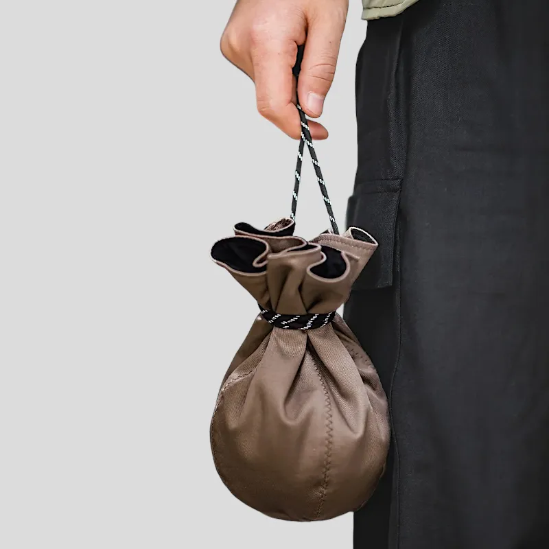 Reversible hat and convertible coin bag